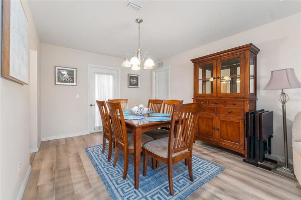 Chandelier, Dining room, Interior, Pendant Lights, Wood Texture Flooring