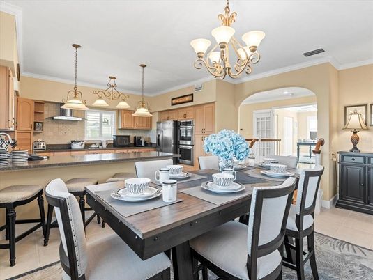 Chandelier, Dining room, Interior, Kitchen, Pendant Lights, Recessed Lighting, Stainless Steel Appliances