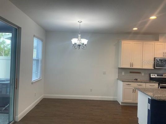 Chandelier, Interior, Kitchen, Recessed Lighting, Stainless Steel Appliances, Wood Texture Flooring