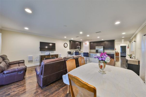 Dining room, Interior, Kitchen, Living room, Recessed Lighting, Stainless Steel Appliances, Wood Texture Flooring