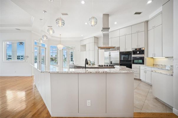 Interior, Kitchen, Pendant Lights, Recessed Lighting, Stainless Steel Appliances, Wood Texture Flooring
