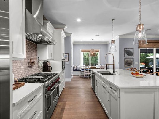 Dining room, Interior, Kitchen, Pendant Lights, Recessed Lighting, Stainless Steel Appliances, Wood Texture Flooring