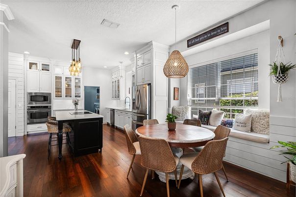 Dining room, Interior, Kitchen, Pendant Lights, Recessed Lighting, Stainless Steel Appliances, Wood Texture Flooring