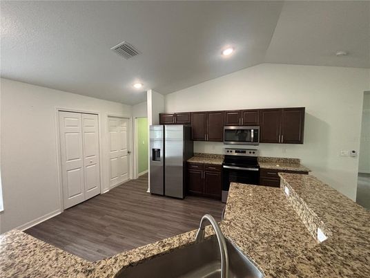 Interior, Kitchen, Recessed Lighting, Stainless Steel Appliances, Wood Texture Flooring