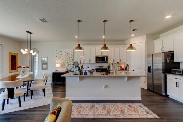 Dining room, Interior, Kitchen, Pendant Lights, Recessed Lighting, Stainless Steel Appliances, Wood Texture Flooring