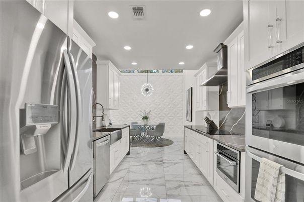 Chandelier, Dining room, Interior, Kitchen, Marble, Recessed Lighting, Stainless Steel Appliances