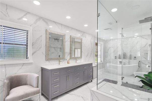 Bathroom, Dual Sink Vanities, Free Standing Baths, Glass Shower, Interior, Marble, Marble Walls, Recessed Lighting