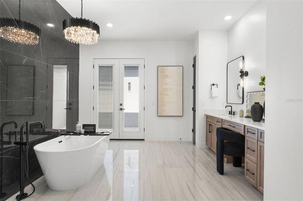 Bathroom, Chandelier, Dual Sink Vanities, Free Standing Baths, Interior, Marble, Recessed Lighting