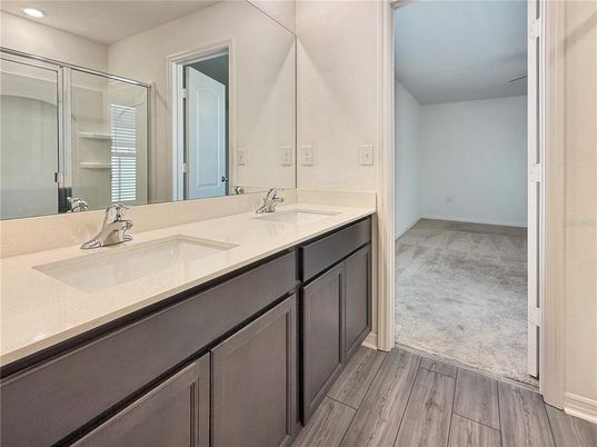 Bathroom, Dual Sink Vanities, Interior, Recessed Lighting, Wood Texture Flooring