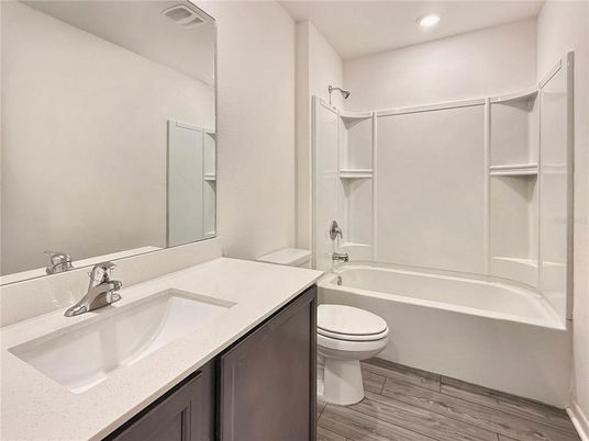 Bathroom, Dual Sink Vanities, Interior, Recessed Lighting, Wood Texture Flooring