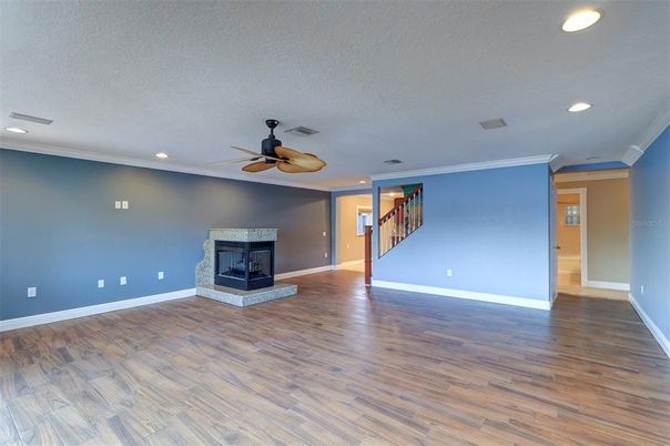 Empty room, Fireplace, Interior, Recessed Lighting, Wood Texture Flooring