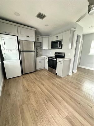 Interior, Kitchen, Stainless Steel Appliances, Washer, Wood Texture Flooring