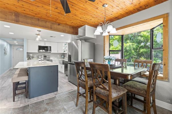 Chandelier, Dining room, Interior, Kitchen, Pendant Lights, Recessed Lighting, Stainless Steel Appliances, Wooden Ceilings