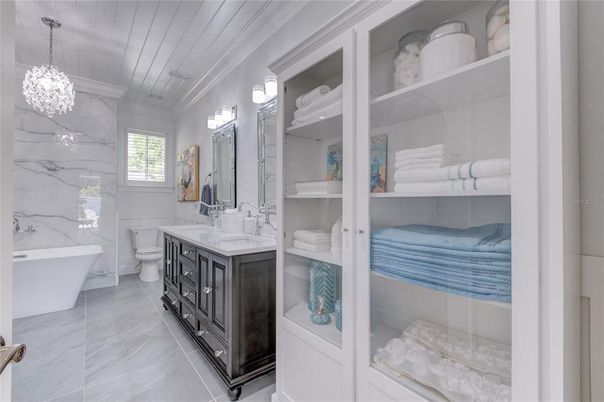 Bathroom, Dual Sink Vanities, Free Standing Baths, Interior, Marble Walls, Pendant Lights