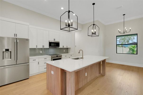 Interior, Kitchen, Pendant Lights, Recessed Lighting, Stainless Steel Appliances, Wood Texture Flooring
