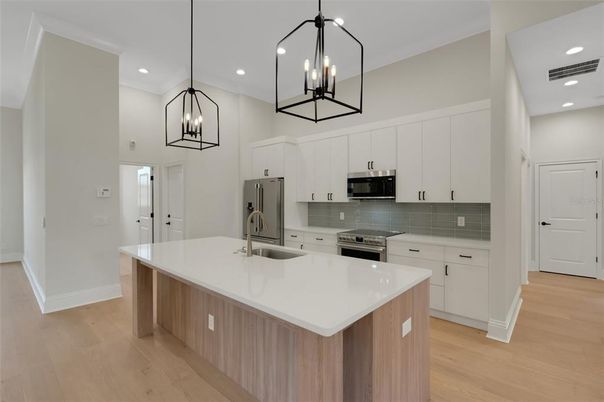 Interior, Kitchen, Pendant Lights, Recessed Lighting, Stainless Steel Appliances, Wood Texture Flooring