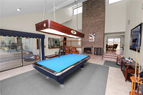 Billiard Table, Dining room, Fireplace, Game Room, Interior, Pendant Lights, Recessed Lighting, Stone Walls