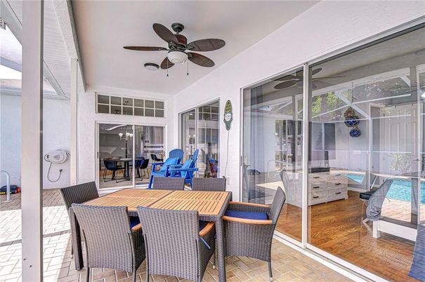 Dining room, Interior, Pool, Sun Room, Wood Texture Flooring