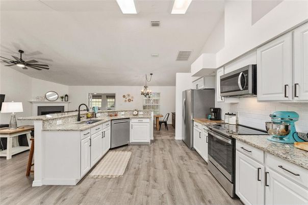 Chandelier, Interior, Kitchen, Stainless Steel Appliances, Wood Texture Flooring