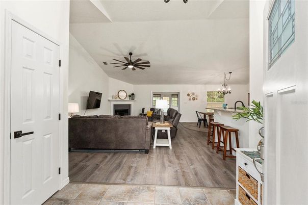 Chandelier, Dining room, Fireplace, Interior, Living room, Wood Texture Flooring