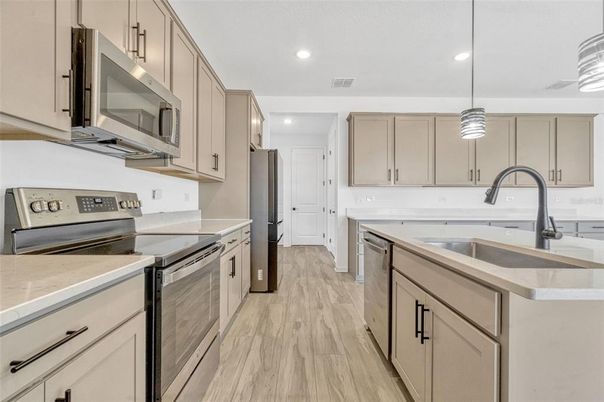 Interior, Kitchen, Pendant Lights, Recessed Lighting, Stainless Steel Appliances, Wood Texture Flooring