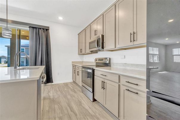Interior, Kitchen, Recessed Lighting, Stainless Steel Appliances, Wood Texture Flooring