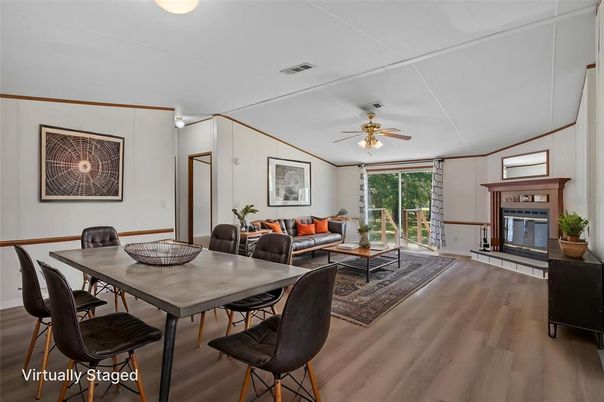 Dining room, Fireplace, Interior, Living room, Wood Texture Flooring