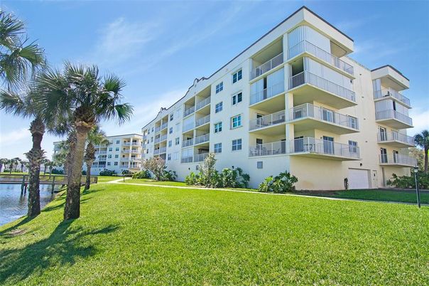 Backyard, Exterior, Facade, Water, Condo Building