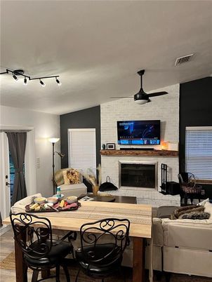 Dining room, Fireplace, Interior, Living room, Stone Walls, Wood Texture Flooring