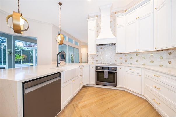 Interior, Kitchen, Pendant Lights, Recessed Lighting, Stainless Steel Appliances, Wood Texture Flooring