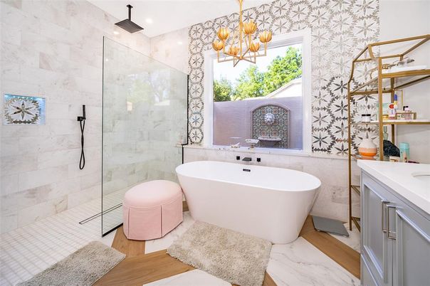 Bathroom, Chandelier, Free Standing Baths, Glass Shower, Interior, Marble, Marble Walls, Pendant Lights, Recessed Lighting, Wood Texture Flooring