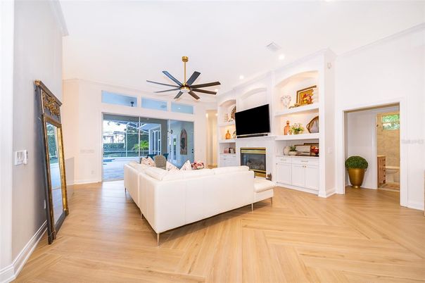 Fireplace, Interior, Living room, Recessed Lighting, Wood Texture Flooring