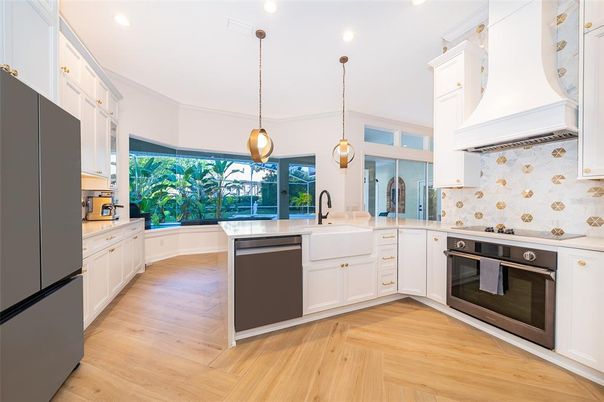 Interior, Kitchen, Pendant Lights, Recessed Lighting, Stainless Steel Appliances, Wood Texture Flooring