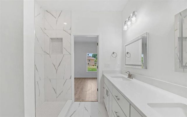 Bathroom, Dual Sink Vanities, Interior, Marble, Marble Walls, Wood Texture Flooring