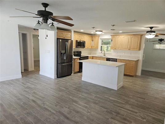 Interior, Kitchen, Recessed Lighting, Stainless Steel Appliances, Wood Texture Flooring