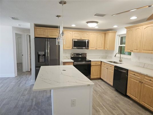 Interior, Kitchen, Pendant Lights, Recessed Lighting, Stainless Steel Appliances, Wood Texture Flooring