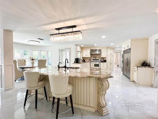 Chandelier, Dining room, Interior, Kitchen, Marble, Recessed Lighting, Stainless Steel Appliances