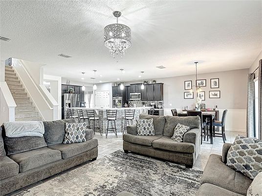 Chandelier, Dining room, Interior, Kitchen, Living room, Pendant Lights, Stainless Steel Appliances