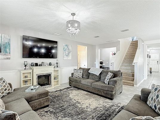 Chandelier, Fireplace, Interior, Living room