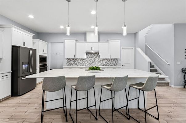 Interior, Kitchen, Pendant Lights, Recessed Lighting, Stainless Steel Appliances, Wood Texture Flooring