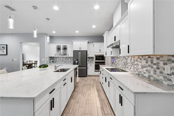 Interior, Kitchen, Pendant Lights, Recessed Lighting, Stainless Steel Appliances, Wood Texture Flooring
