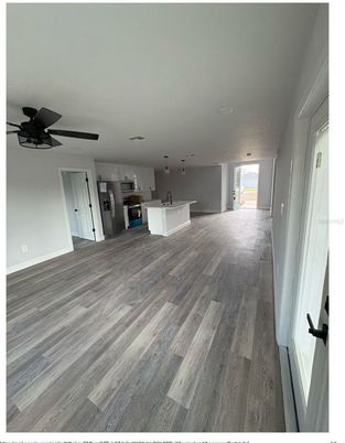 Empty room, Interior, Kitchen, Stainless Steel Appliances, Wood Texture Flooring