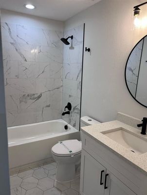 Bathroom, Dual Sink Vanities, Interior, Marble, Marble Walls, Recessed Lighting