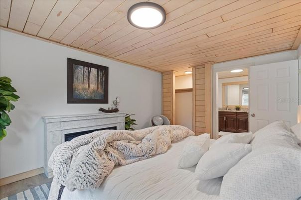Bedroom, Fireplace, Interior, Recessed Lighting, Wooden Ceilings, Wood Texture Flooring