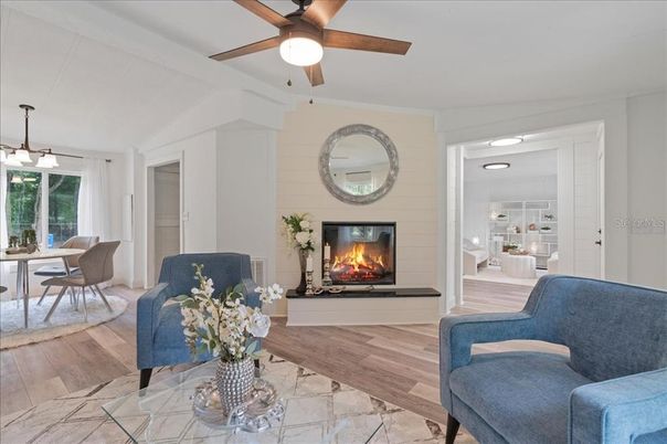 Dining room, Fireplace, Interior, Pendant Lights, Wood Texture Flooring