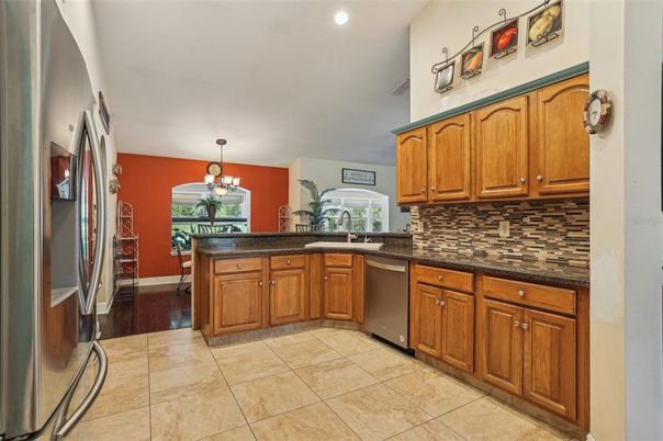 Chandelier, Interior, Kitchen, Recessed Lighting, Stainless Steel Appliances, Wood Texture Flooring