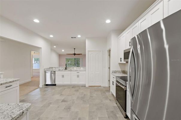 Interior, Kitchen, Recessed Lighting, Stainless Steel Appliances, Wood Texture Flooring