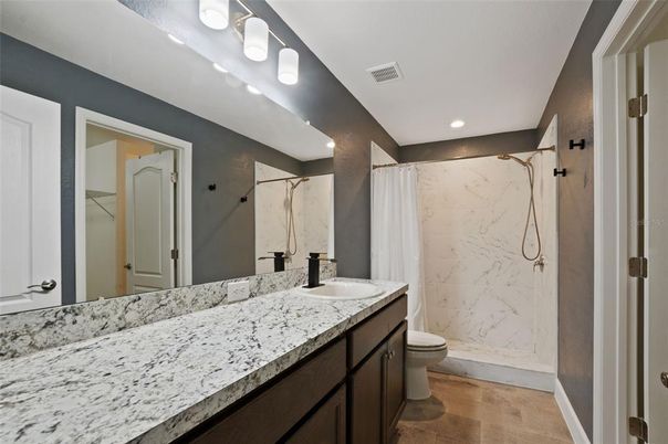 Bathroom, Dual Sink Vanities, Interior, Marble Walls, Recessed Lighting