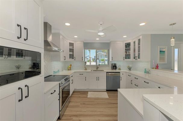 Interior, Kitchen, Pendant Lights, Recessed Lighting, Stainless Steel Appliances, Wood Texture Flooring