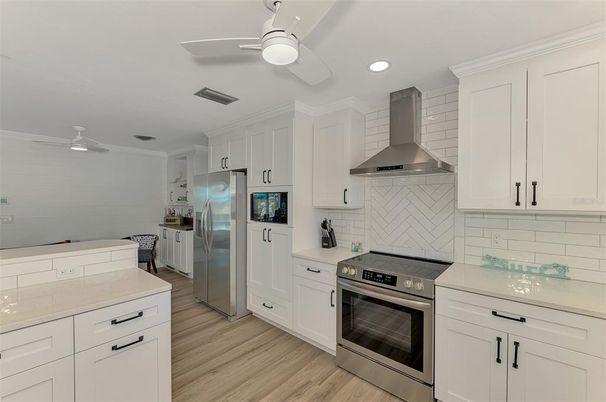 Interior, Kitchen, Recessed Lighting, Stainless Steel Appliances, Wood Texture Flooring